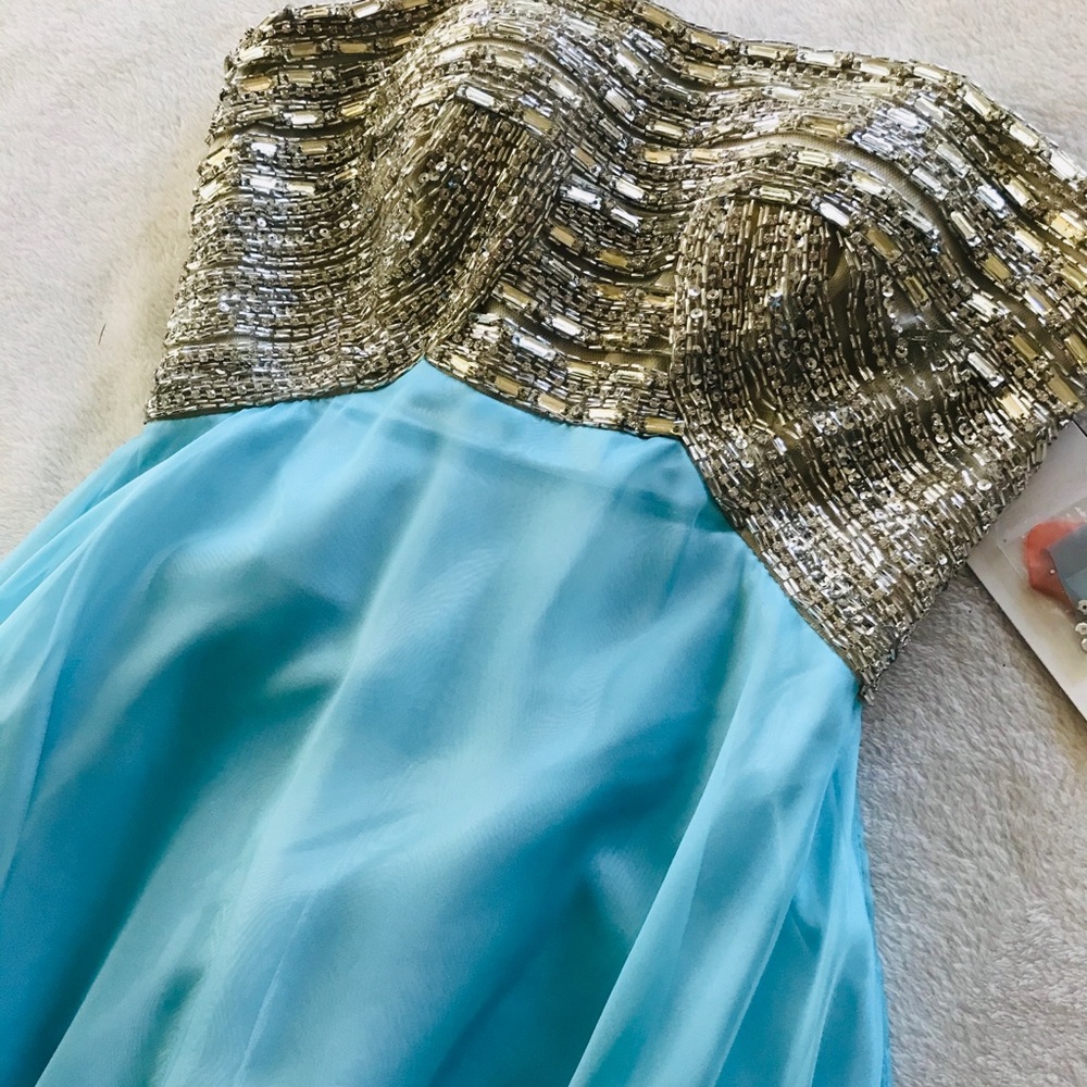 Bridesmaids dress/gown new with tag never worn.